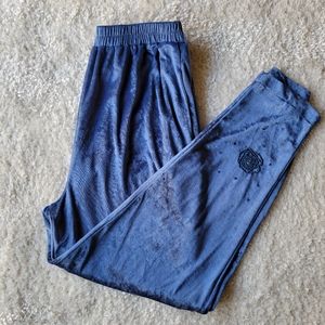 Powder blue velour track pants with floral embroidery details size large